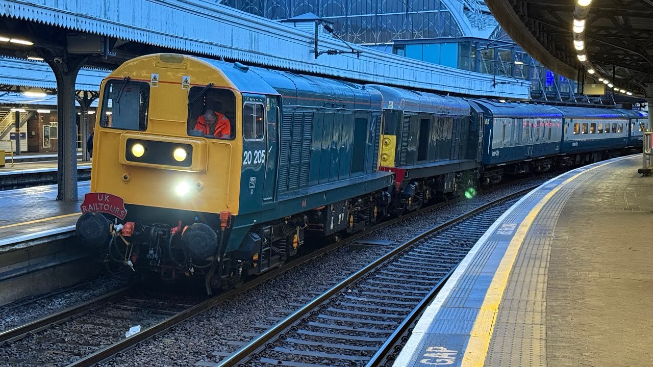 BR Class 20 nos. 20205, 20007 and 20142 depart London Paddington with ...