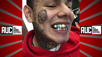 6ix9ine Spends $150K On Rainbow Diamond Teeth With Fangs