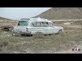 ABANDONED GHOSTBUSTERS CAR IN THE DESERT