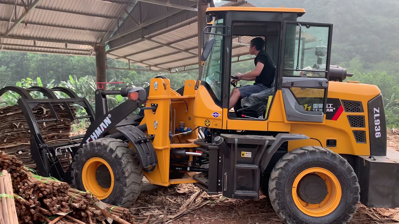 Xúc lật gắp gỗ Trung Quốc và khách hàng xưởng bóc-LH: 0987357463