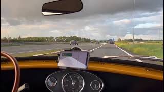 Pulling up on the highway with Classic Mini 1275 Automatic