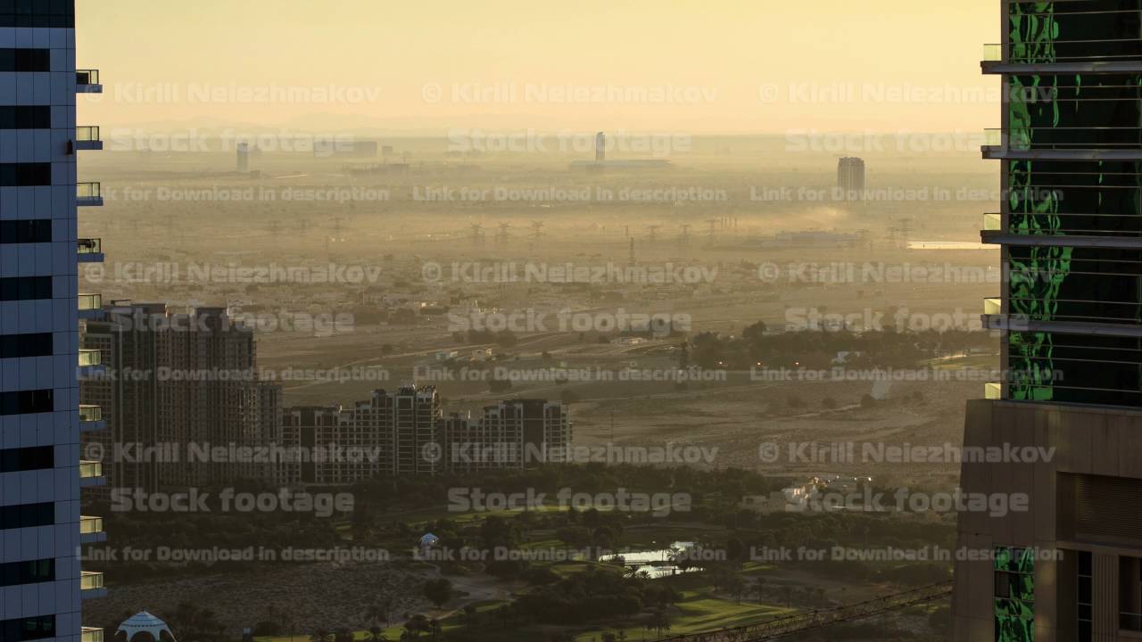 Morning after sunrise aerial view skyscraper foggy weather Dubai Marina at United Arab Emirates UAE