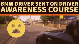 BMW driver forces cyclist to take evasive action