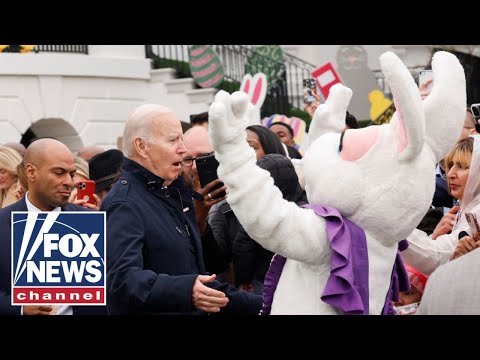 Biden whisked away by 'Easter bunny' while taking reporter questions