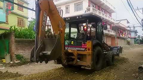 Laying Ballast On The Road Working Case Loader During The Rainy Day - Case Backhoe Video | RoadPlan