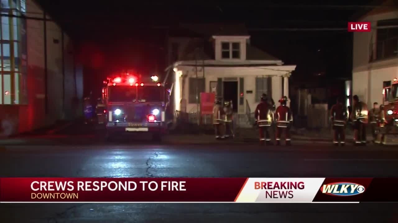 Fire crews work to put out blazing house in downtown Louisville - YouTube