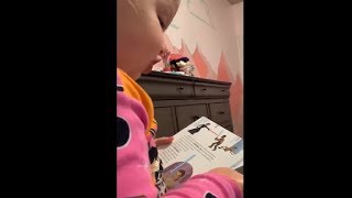 Baby Girl Reading Herself The Bedtime Story