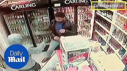 CCTV shows moment Cambridgeshire knifeman lunges at shop assistant
