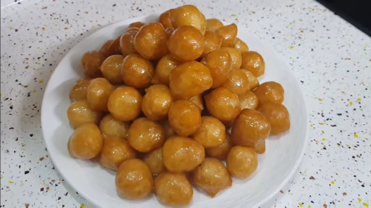 طريقة عمل العوامات 😋او لقمة القاضي الذهبيه المقرمشه🤗👌
