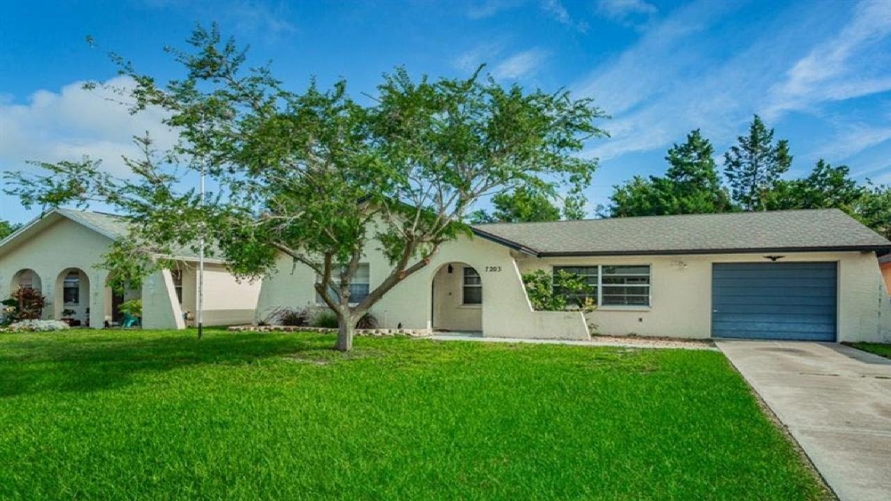 7203 CARMEL AVENUE, NEW PORT RICHEY, FL Presented by The Steele Home