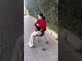 Thickened stainless steel wheeled and seated elderly walking aid.