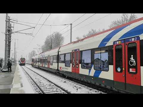 Voie unique entre F-Annecy F-Annemasse. Croisement de deux trains CFF (Suisse) en gare de Reignier