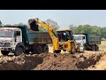 Jcb 3dx backhoe fully loading mud with tata 2518 truck stuck in mud pulling by jcb