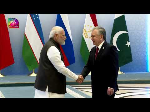 President of Uzbekistan Shavkat Mirziyoyev welcomes PM Modi at the SCO Summit