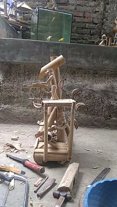kincir air bambu menyerut kayu & gergaji