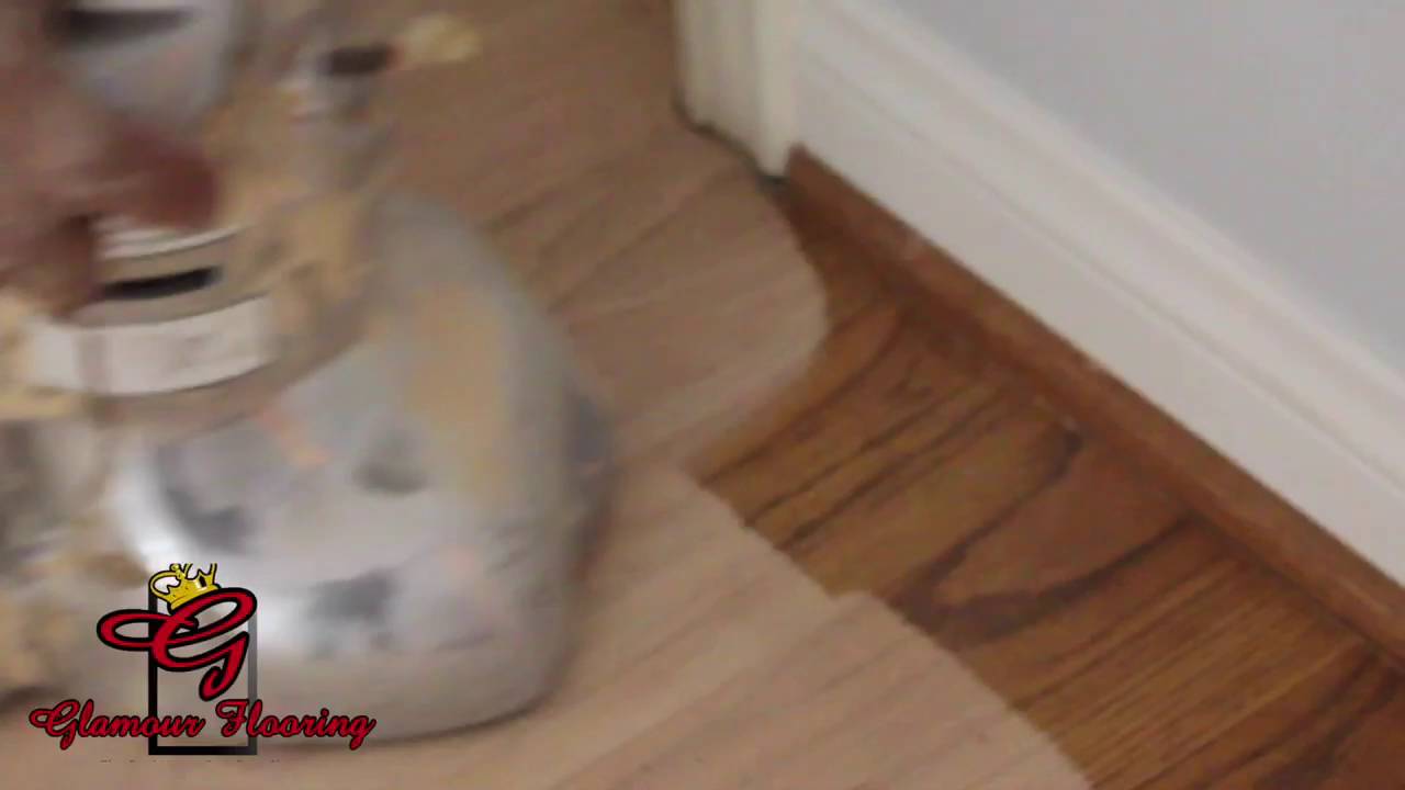 Hardwood floor being re-sanded and refinished by Glamour Flooring in Los Angeles