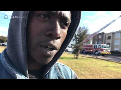 A man catches a baby during an apartment fire