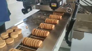 Skywin biscuit sandwich and on edge packing line
