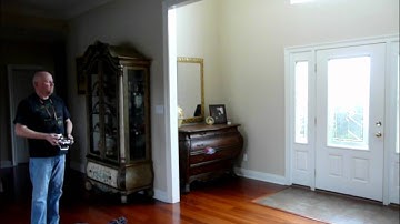 RC helicopter Mcpx V2 First flip indoor and ceiling landing caught on video