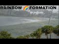 Rainbow  formation in drizzling rain  natural view