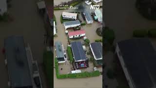 Surfs Up: Man Surfs Flooded UK Road on Wakeboard