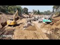 Professional engineering canal construction bulldozer paving stone excavator trimming slope