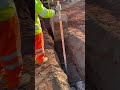 Checking dig level with laser