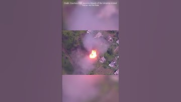 Drone shows shells exploding in village near Bakhmut