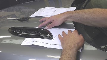 Fitting dummy bonnet vents to a Range Rover Evoque.