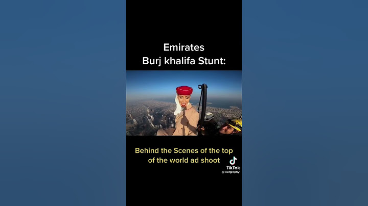 Emirates flight attendant on top of Burj Khalifa well done 👍