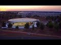 Drone footage shows Apple's nearly finished spaceship campus against stunning sunset