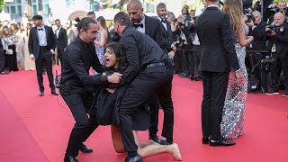 Cannes Film Festivali Kırmızı Halıda Soyunan Kadından Rusya Protestosu