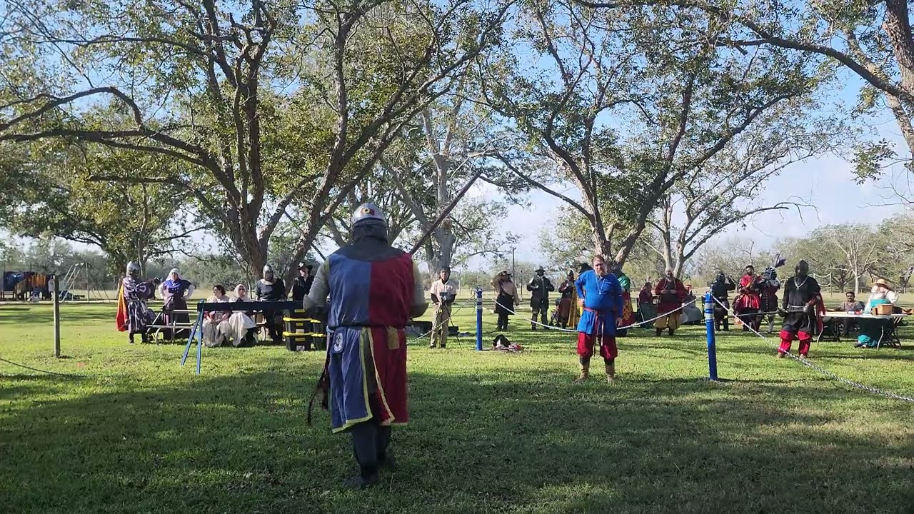 Greatsword Round at the Barony of Bjornsborg's fall event: Lord Owen in red and blue 