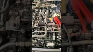 Volkswagen Golf removing coil packs. seized coil packs spark plug removal.