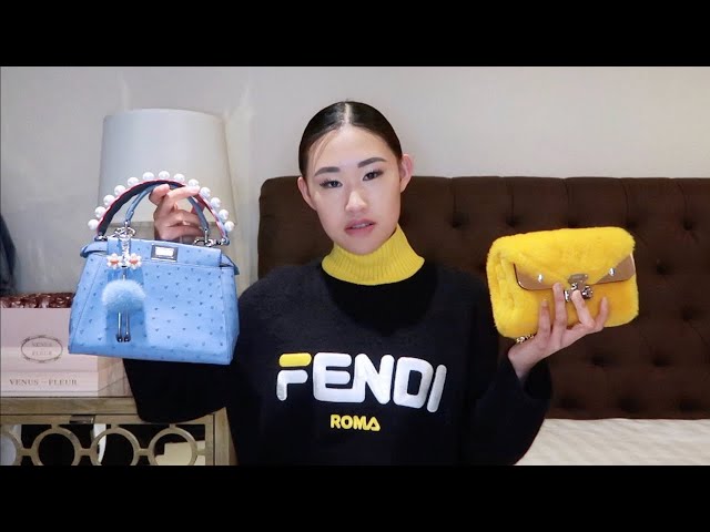 FILE--A Chinese examiner identifies a luxury bag of Fendi at