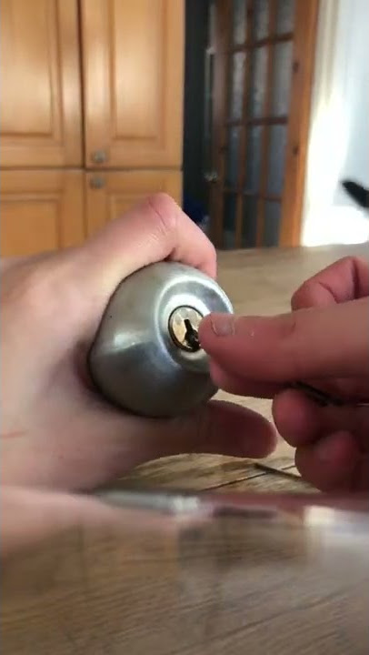 Lock picking a doorknob with hairclip