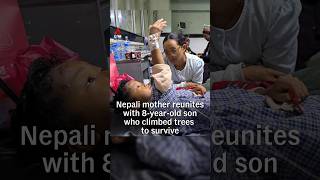 Nepali mother reunites with 8-year-old son who climbed trees to survive