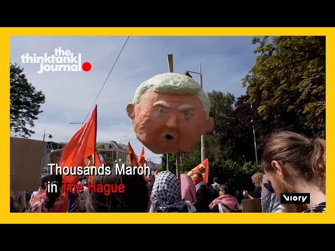 Iranian and Palestinian flags, demonstrators call out NATO’s global role