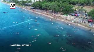 Maui remembers the 102 lost in the Lahaina wildfire with a paddle out 1 year after devastating blaze