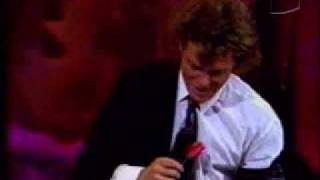 Video thumbnail of "LUIS MIGUEL - UN HOMBRE BUSCA UNA MUJER"