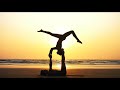 Relaxing music for yoga. 4K couple doing yoga on sunset. Релакс музыка для йоги. Йога на рассвете