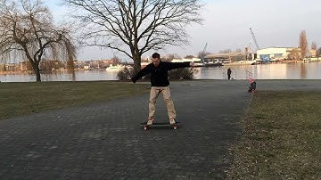 Longboarding: Slo-Mo Trick Tips - 180° Slide | How to Stand Up Slide