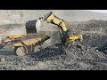 Caterpillar 6015 Excavator Loading Full Bucket to Truck Coal