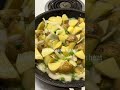Curry chicken with potatoes and mushrooms.