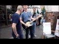 Entertaining Men Basking In The Street Of Camden Town