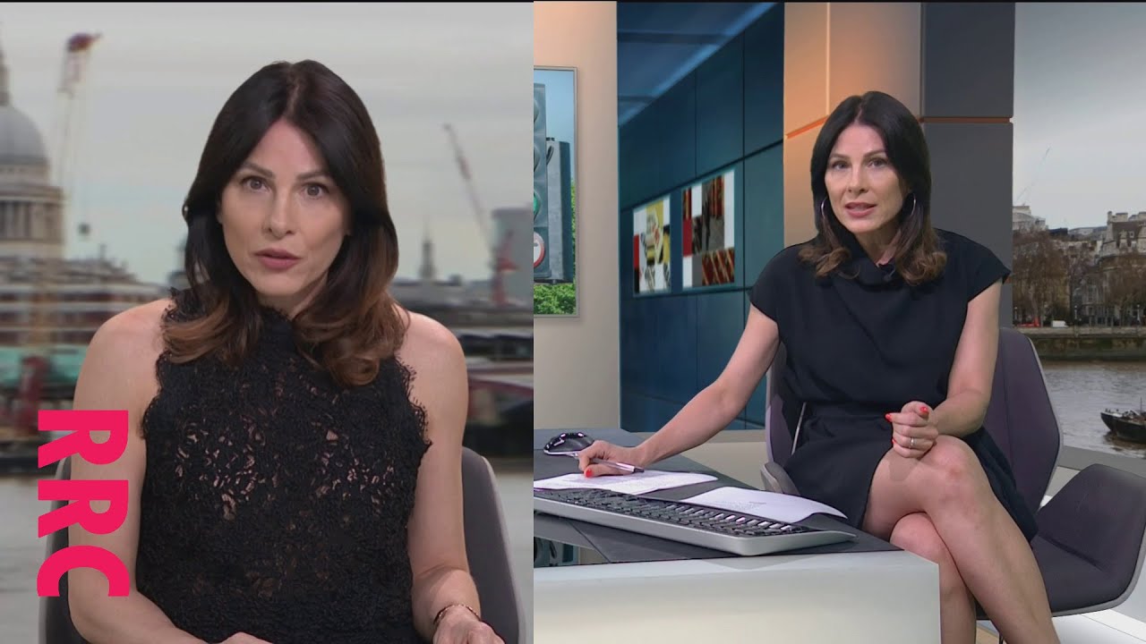 Lucrezia Millarini @leggy sidedesk and a lacey top