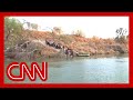 CNN witnesses dozens of migrants trying to cross Rio Grande
