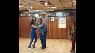 Ziere and Lekeisha stepping on the stage after Ed Donaldson's class