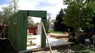 Assembling the main walls of a Studio Shed