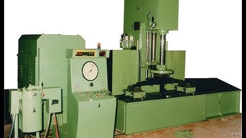 Spring load deflection testing machine